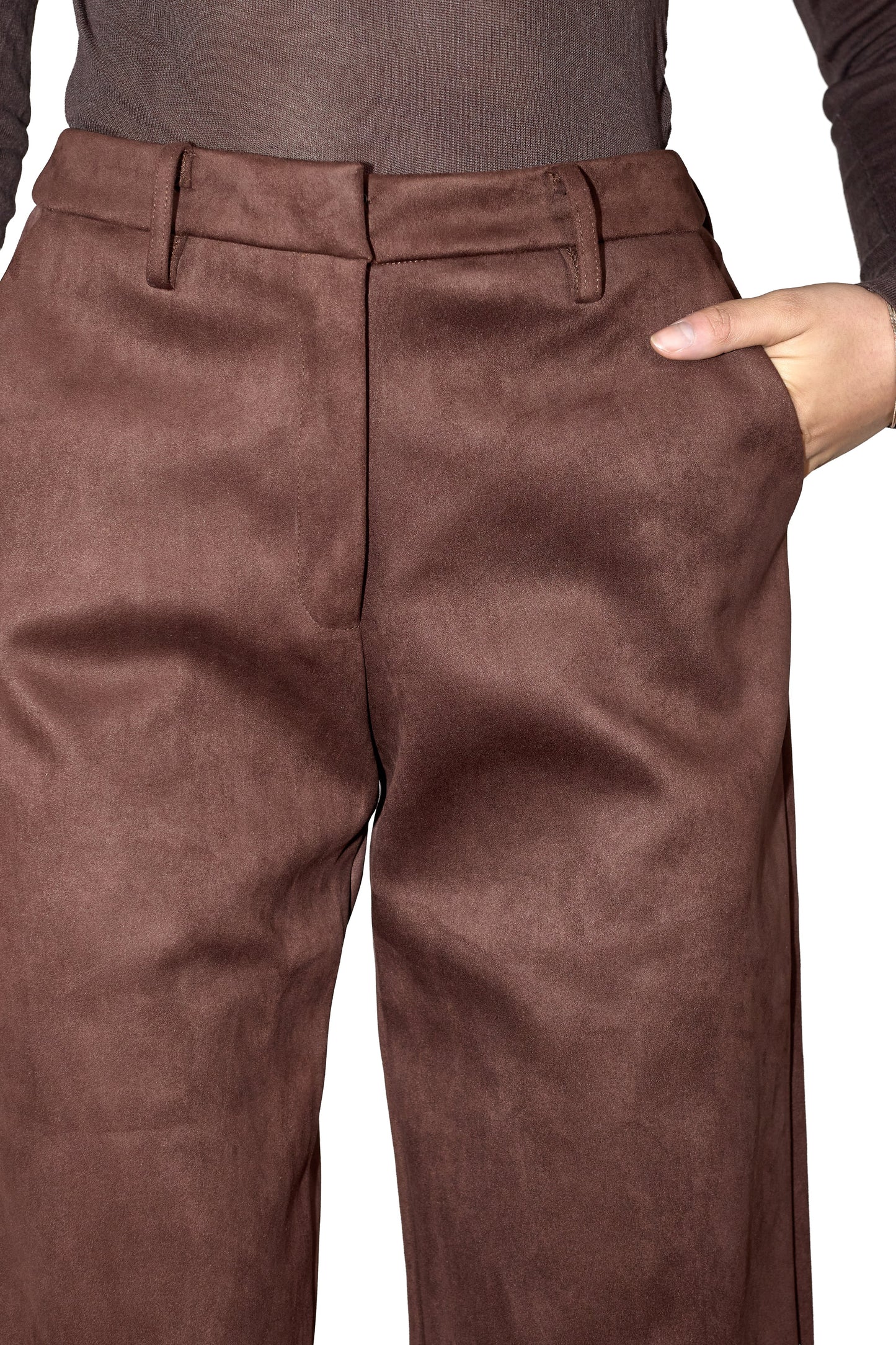 Suede Brown pants worn by a person on a white background