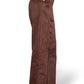Brown suede pants worn by a person on a white background