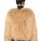 Beige Mongolian fur coat  on a white background