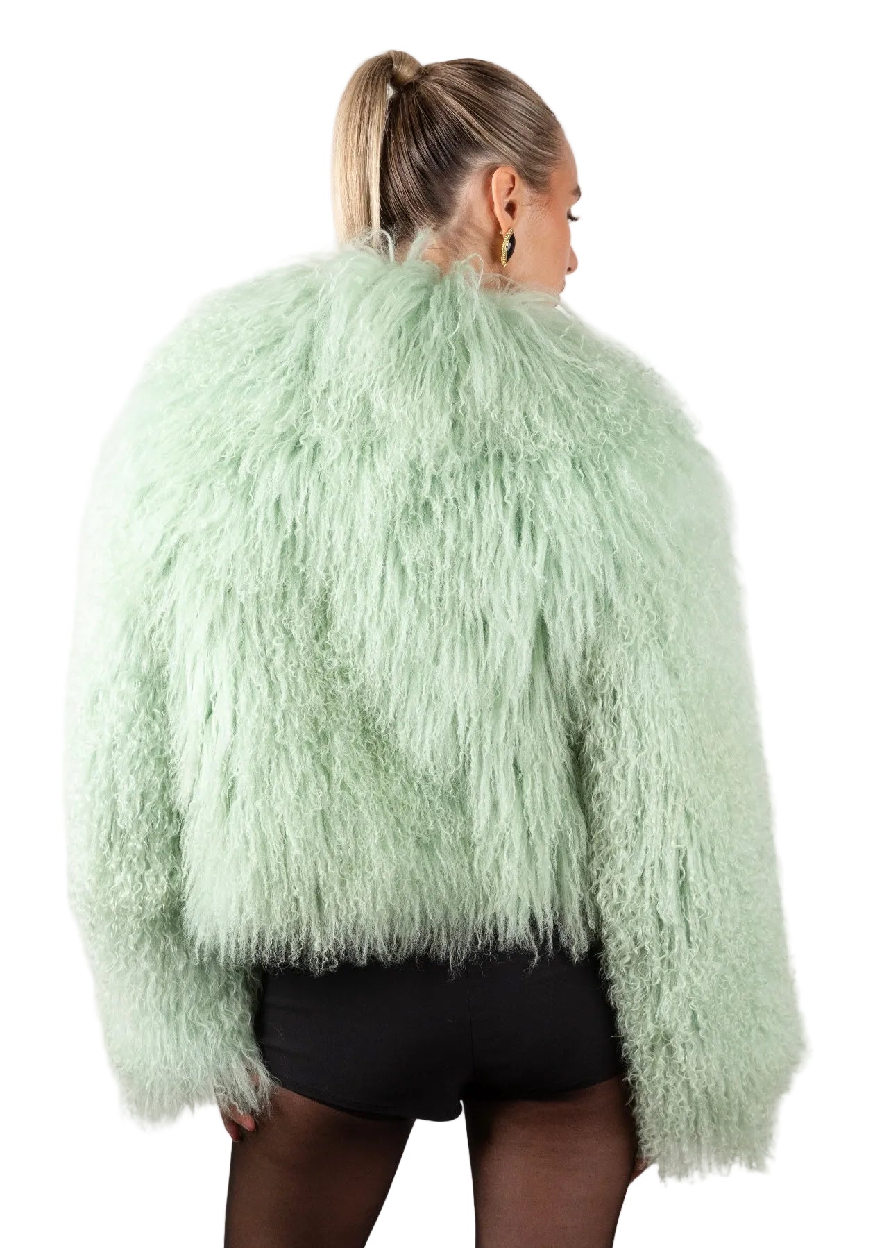 Person wearing a light green Mongolian Green fur  on a white background