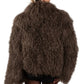 Person wearing a brown Mongolian fur coat  on a white background
