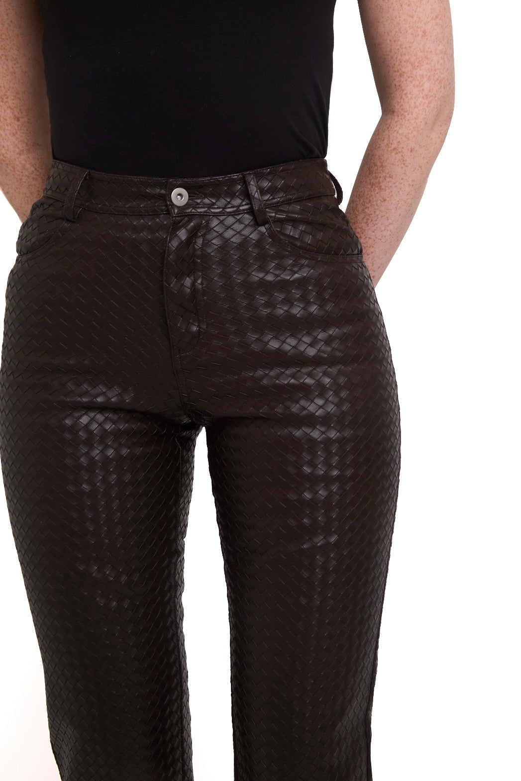 Dark brown Front Brown Woven Leather Trousers  pants worn by a person on a white background