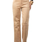 Beige Suede Trousers  pants worn by a person on a plain background