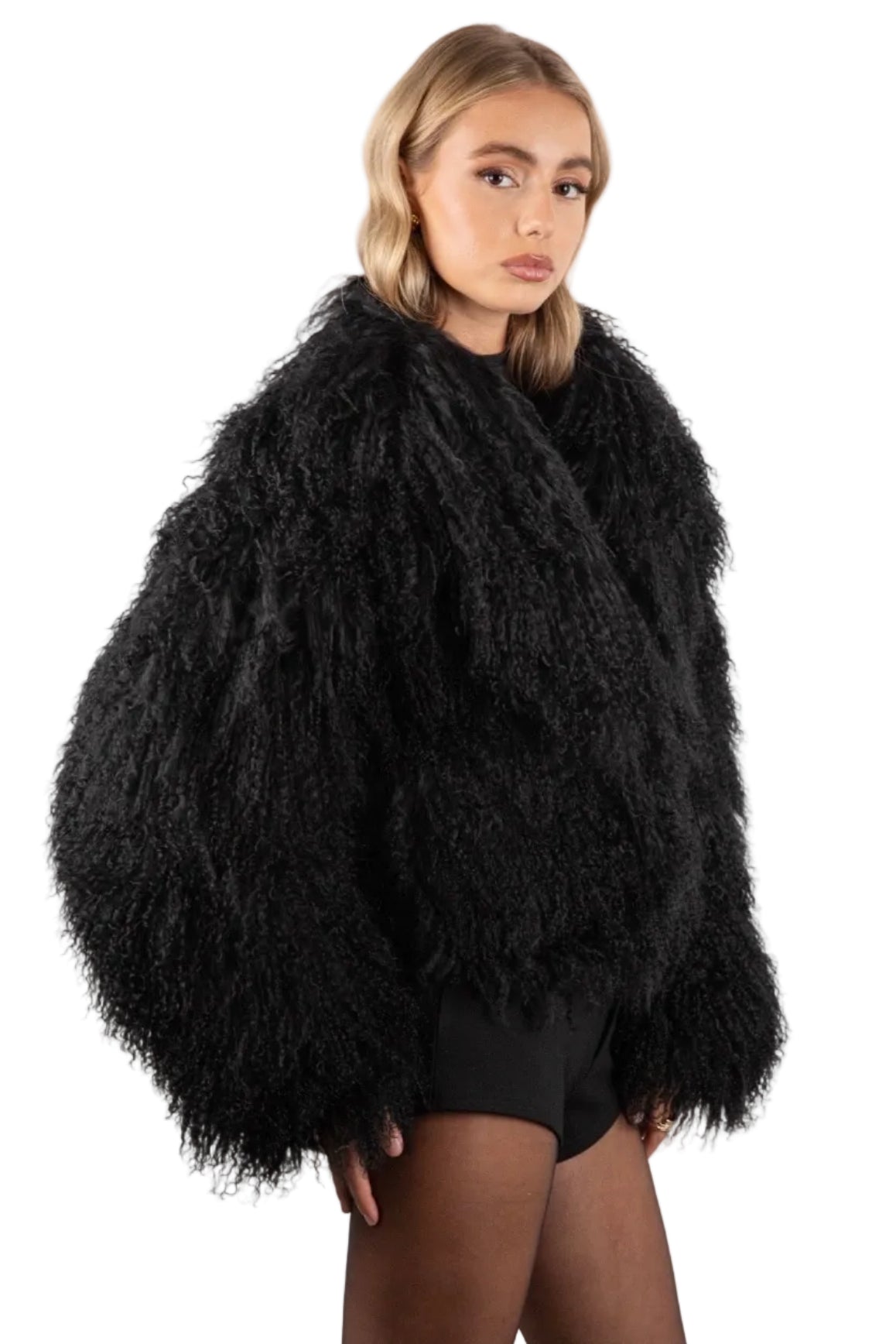 Person wearing a Black Mongolian fur coat on a white background