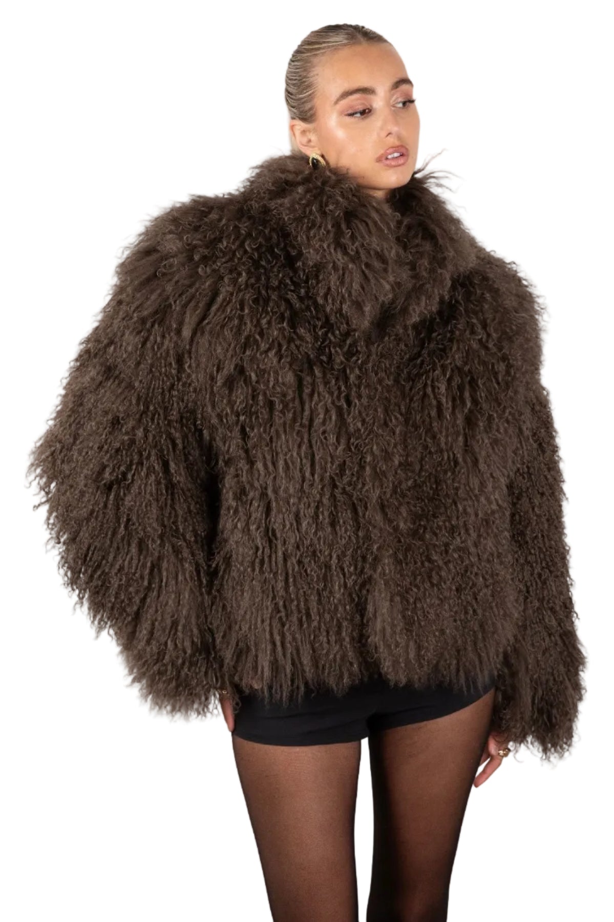 Person wearing a brown Mongolian fur coat  on a white background