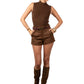 Woman wearing a brown sleeveless top and shorts with matching knee-high boots on a plain background